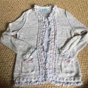 Baby blue and white cardigan with orange accent